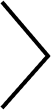 Right-pointing chevron or arrow symbol in black, indicating next page or forward navigation.